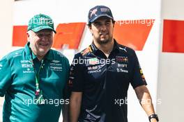 (L to R): Norbert Vettel (GER) with Sergio Perez (MEX) Red Bull Racing. 19.11.2022. Formula 1 World Championship, Rd 22, Abu Dhabi Grand Prix, Yas Marina Circuit, Abu Dhabi, Qualifying Day.