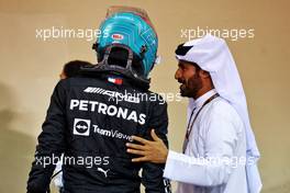 (L to R): George Russell (GBR) Mercedes AMG F1 with Mohammed Bin Sulayem (UAE) FIA President in qualifying parc ferme. 19.11.2022. Formula 1 World Championship, Rd 22, Abu Dhabi Grand Prix, Yas Marina Circuit, Abu Dhabi, Qualifying Day.
