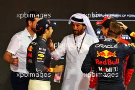 (L to R): Sergio Perez (MEX) Red Bull Racing with Mohammed Bin Sulayem (UAE) FIA President; Charles Leclerc (MON) Ferrari; and Max Verstappen (NLD) Red Bull Racing. 19.11.2022. Formula 1 World Championship, Rd 22, Abu Dhabi Grand Prix, Yas Marina Circuit, Abu Dhabi, Qualifying Day.
