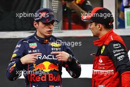 (L to R): Max Verstappen (NLD) Red Bull Racing in qualifying parc ferme with Charles Leclerc (MON) Ferrari. 19.11.2022. Formula 1 World Championship, Rd 22, Abu Dhabi Grand Prix, Yas Marina Circuit, Abu Dhabi, Qualifying Day.