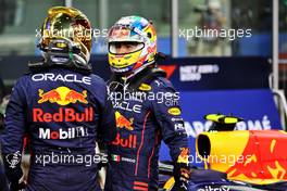Sergio Perez (MEX) Red Bull Racing (Right) in qualifying parc ferme with team mate Max Verstappen (NLD) Red Bull Racing. 19.11.2022. Formula 1 World Championship, Rd 22, Abu Dhabi Grand Prix, Yas Marina Circuit, Abu Dhabi, Qualifying Day.