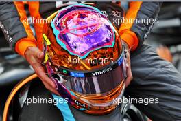 The helmet of Daniel Ricciardo (AUS) McLaren at a team photograph. 20.11.2022. Formula 1 World Championship, Rd 22, Abu Dhabi Grand Prix, Yas Marina Circuit, Abu Dhabi, Race Day.