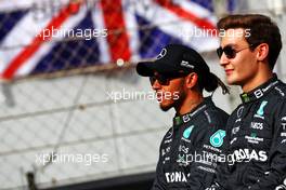 Lewis Hamilton (GBR) Mercedes AMG F1 and George Russell (GBR) Mercedes AMG F1 at the end of year drivers' photograph. 20.11.2022. Formula 1 World Championship, Rd 22, Abu Dhabi Grand Prix, Yas Marina Circuit, Abu Dhabi, Race Day.