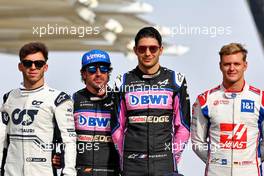 (L to R): Pierre Gasly (FRA) AlphaTauri; Fernando Alonso (ESP) Alpine F1 Team; Esteban Ocon (FRA) Alpine F1 Team; and Mick Schumacher (GER) Haas F1 Team, at the end of year drivers' photograph. 20.11.2022. Formula 1 World Championship, Rd 22, Abu Dhabi Grand Prix, Yas Marina Circuit, Abu Dhabi, Race Day.