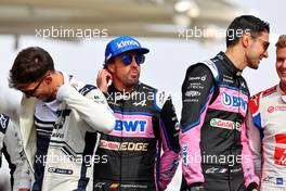 (L to R): Pierre Gasly (FRA) AlphaTauri; Fernando Alonso (ESP) Alpine F1 Team; Esteban Ocon (FRA) Alpine F1 Team; and Mick Schumacher (GER) Haas F1 Team, at the end of year drivers' photograph. 20.11.2022. Formula 1 World Championship, Rd 22, Abu Dhabi Grand Prix, Yas Marina Circuit, Abu Dhabi, Race Day.