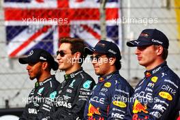 (L to R): Lewis Hamilton (GBR) Mercedes AMG F1; George Russell (GBR) Mercedes AMG F1; Sergio Perez (MEX) Red Bull Racing; and Max Verstappen (NLD) Red Bull Racing, at the end of year drivers' photograph. 20.11.2022. Formula 1 World Championship, Rd 22, Abu Dhabi Grand Prix, Yas Marina Circuit, Abu Dhabi, Race Day.