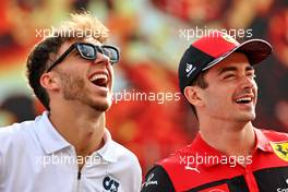 (L to R): Pierre Gasly (FRA) AlphaTauri and Charles Leclerc (MON) Ferrari on the drivers parade. 20.11.2022. Formula 1 World Championship, Rd 22, Abu Dhabi Grand Prix, Yas Marina Circuit, Abu Dhabi, Race Day.