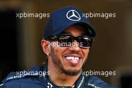 Lewis Hamilton (GBR) Mercedes AMG F1 at a team photograph. 17.11.2022. Formula 1 World Championship, Rd 22, Abu Dhabi Grand Prix, Yas Marina Circuit, Abu Dhabi, Preparation Day.