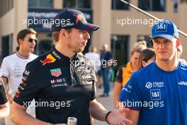 (L to R): Max Verstappen (NLD) Red Bull Racing with Mick Schumacher (GER) Haas F1 Team. 17.11.2022. Formula 1 World Championship, Rd 22, Abu Dhabi Grand Prix, Yas Marina Circuit, Abu Dhabi, Preparation Day.