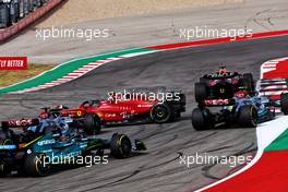 Carlos Sainz Jr (ESP) Ferrari F1-75 is hit by George Russell (GBR) Mercedes AMG F1 W13 at the start of the race. 23.10.2022. Formula 1 World Championship, Rd 19, United States Grand Prix, Austin, Texas, USA, Race Day.
