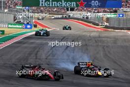 (L to R): Charles Leclerc (MON) Ferrari F1-75 and Sergio Perez (MEX) Red Bull Racing RB18 battle for position. 23.10.2022. Formula 1 World Championship, Rd 19, United States Grand Prix, Austin, Texas, USA, Race Day.