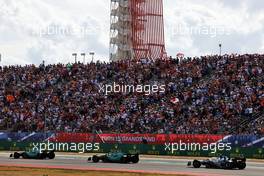 Sebastian Vettel (GER) Aston Martin F1 Team AMR22 leads Lance Stroll (CDN) Aston Martin F1 Team AMR22 and Pierre Gasly (FRA) AlphaTauri AT03. 23.10.2022. Formula 1 World Championship, Rd 19, United States Grand Prix, Austin, Texas, USA, Race Day.