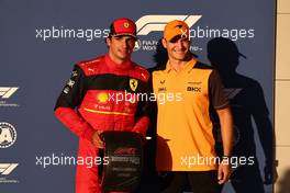 Carlos Sainz Jr (ESP) Ferrari with Alex Palou (ESP) McLaren MCL36 Test Driver.. 22.10.2022. Formula 1 World Championship, Rd 19, United States Grand Prix, Austin, Texas, USA, Qualifying Day.