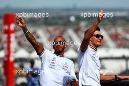 (L to R): Lewis Hamilton (GBR) Mercedes AMG F1 and team mate George Russell (GBR) Mercedes AMG F1 on the drivers parade. 23.10.2022. Formula 1 World Championship, Rd 19, United States Grand Prix, Austin, Texas, USA, Race Day.