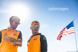 Lando Norris (GBR) McLaren walks the circuit with Jose Manuel Lopez Garcia (ESP) McLaren Lead Performance Engineer. 20.10.2022. Formula 1 World Championship, Rd 19, United States Grand Prix, Austin, Texas, USA, Preparation Day.