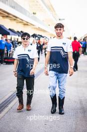 (L to R): Yuki Tsunoda (JPN) AlphaTauri and team mate Pierre Gasly (FRA) AlphaTauri. 20.10.2022. Formula 1 World Championship, Rd 19, United States Grand Prix, Austin, Texas, USA, Preparation Day.