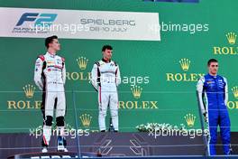 The podium (L to R): Theo Pourchaire (FRA) ART, second; Marcus Armstrong (NZL) Hitech, race winner; Jack Doohan (AUS) Virtuosi Racing, third. 09.07.2022. FIA Formula 2 Championship, Rd 8, Spielberg, Austria, Saturday.