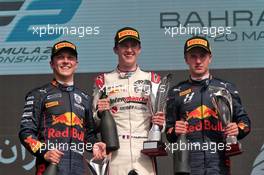 The podium (L to R): Liam Lawson (NZL) Carlin, second; Theo Pourchaire (FRA) ART, race winner; Juri Vips (EST) Red Bull Racing, third. 20.03.2022. FIA Formula 2 Championship, Rd 1, Feature Race, Sakhir, Bahrain, Sunday.