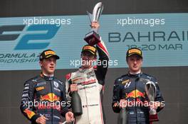 The podium (L to R): Liam Lawson (NZL) Carlin, second; Theo Pourchaire (FRA) ART, race winner; Juri Vips (EST) Red Bull Racing, third. 20.03.2022. FIA Formula 2 Championship, Rd 1, Feature Race, Sakhir, Bahrain, Sunday.