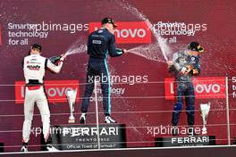 The podium (L to R): Theo Pourchaire (FRA) ART, second; Logan Sargeant (USA) Carlin, race winner; Logan Sargeant (USA) Carlin, third. 03.07.2022. FIA Formula 2 Championship, Rd 7, Feature Race, Silverstone, England, Sunday.