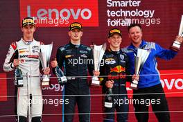 The podium (L to R): Theo Pourchaire (FRA) ART, second; Logan Sargeant (USA) Carlin, race winner; Logan Sargeant (USA) Carlin, third. 03.07.2022. FIA Formula 2 Championship, Rd 7, Feature Race, Silverstone, England, Sunday.