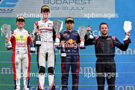 The podium (L to R): Enzo Fittipaldi (BRA) Charouz Racing System, second; Theo Pourchaire (FRA) ART, race winner; Ayumu Iwasa (JPN) Dams, third. 31.07.2022. FIA Formula 2 Championship, Rd 10, Budapest, Hungary, Feature Race, Sunday.