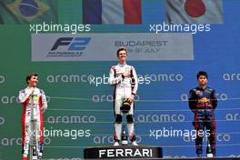 The podium (L to R): Enzo Fittiapldi (BRA) Charouz Racing System, second; Theo Pourchaire (FRA) ART, race winner; Ayumu Iwasa (JPN) Dams, third. 31.07.2022. FIA Formula 2 Championship, Rd 10, Budapest, Hungary, Feature Race, Sunday.
