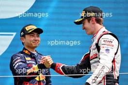 Race winner Theo Pourchaire (FRA) ART (Right) celebrates on the podium with third placed Ayumu Iwasa (JPN) Dams. 31.07.2022. FIA Formula 2 Championship, Rd 10, Budapest, Hungary, Feature Race, Sunday.