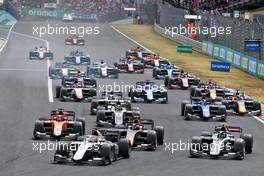 Marcus Armstrong (NZL) Hitech leads at the start of the race. 31.07.2022. FIA Formula 2 Championship, Rd 10, Budapest, Hungary, Feature Race, Sunday.