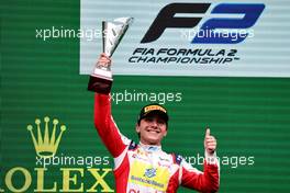 Enzo Fittiapldi (BRA) Charouz Racing System celebrates his second position on the podium. 24.04.2022. FIA Formula 2 Championship, Rd 3, Feature Race, Imola, Italy, Sunday.