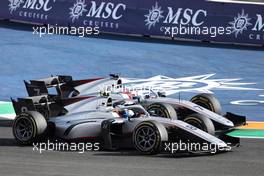 Juri Vips (EST) Hitech and Marcus Armstrong (NZL) Hitech battle for position. 26.03.2022. FIA Formula 2 Championship, Rd 2, Sprint Race, Jeddah, Saudi Arabia, Saturday.
