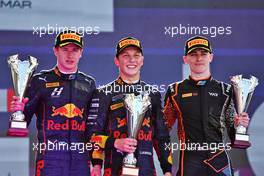The podium (L to R): Juri Vips (EST) Hitech, second; Liam Lawson (NZL) Carlin, race winner; Jake Hughes (GBR) Van Amersfoort Racing, third. 26.03.2022. FIA Formula 2 Championship, Rd 2, Sprint Race, Jeddah, Saudi Arabia, Saturday.