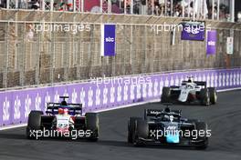 (L to R): Enzo Fittipaldi (BRA) Charouz Racing System and Roy Nissany (ISR) Dams battle for position. 27.03.2022. FIA Formula 2 Championship, Rd 2, Feature Race, Jeddah, Saudi Arabia, Sunday.