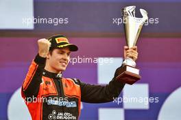 Race winner Felipe Drugovich (BRA) MP Motorsport celebrates on the podium. 27.03.2022. FIA Formula 2 Championship, Rd 2, Feature Race, Jeddah, Saudi Arabia, Sunday.