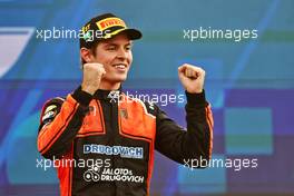 Race winner Felipe Drugovich (BRA) MP Motorsport celebrates on the podium. 27.03.2022. FIA Formula 2 Championship, Rd 2, Feature Race, Jeddah, Saudi Arabia, Sunday.