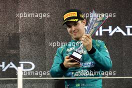 Third placed Felipe Drugovich (BRA) MP Motorsport on the podium. 19.11.2022. Formula 2 Championship, Rd 14, Yas Marina Circuit, Abu Dhabi, UAE, Sprint Race, Saturday.