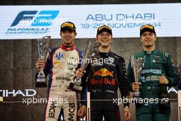 The podium (L to R): Richard Verschoor (NED) Trident, second; Liam Lawson (NZL) Carlin, race winner; Felipe Drugovich (BRA) MP Motorsport, third. 19.11.2022. Formula 2 Championship, Rd 14, Yas Marina Circuit, Abu Dhabi, UAE, Sprint Race, Saturday.