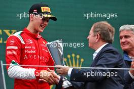 Oliver Bearman (GBR) Prema Racing celebrates his third position on the podium with Martin Brundle (GBR) Sky Sports Commentator. 10.07.2022. FIA Formula 3 Championship, Rd 5, Feature Race, Spielberg, Austria, Sunday.