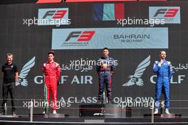 The podium (L to R): Oliver Bearman (GBR) Prema Racing, second; Isack Hadjar (FRA) Hitech, race winner; Alexander Smolyar (RUS) MP Motorsport, third. 19.03.2022. FIA Formula 3 Championship, Rd 1, Sprint Race, Sakhir, Bahrain, Saturday.