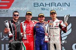 The podium (L to R): Arthur Leclerc (FRA) PREMA Racing, second; Victor Martins (FRA) ART, race winner; Gregoire Saucy (SUI) ART, third. 20.03.2022. FIA Formula 3 Championship, Rd 1, Feature Race, Sakhir, Bahrain, Sunday.