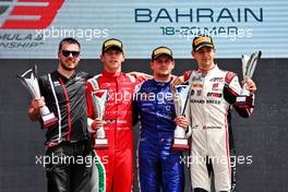 The podium (L to R): Arthur Leclerc (FRA) PREMA Racing, second; Victor Martins (FRA) ART, race winner; Gregoire Saucy (SUI) ART, third. 20.03.2022. FIA Formula 3 Championship, Rd 1, Feature Race, Sakhir, Bahrain, Sunday.