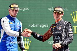 (L to R): Victor Martins (FRA) ART celebrates his second position on the podium with race winner Franco Colapinto (ARG) Van Amersfoort Racing. 23.04.2022. FIA Formula 3 Championship, Rd 2, Sprint Race, Imola, Italy, Saturday.