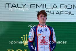 Race winner Roman Stanek (CZE) Trident on the podium. 24.04.2022. FIA Formula 3 Championship, Rd 2, Feature Race, Imola, Italy, Sunday.