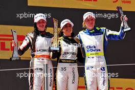 The podium (L to R): Abbi Pulling (GBR) Racing X, second; Jamie Chadwick (GBR) Jenner Racing, race winner; Alice Powell (GBR) Click2Drive Bristol Street Motors Racing W Series Team, third. 21.05.2022. W Series, Rd 2, Barcelona, Spain, Race Day.