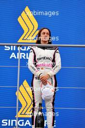 Third placed Marta Garcia (ESP) CortDAO Racing W Series Team on the podium. 02.10.2022. W Series, Rd 6, Marina Bay Street Circuit, Singapore, Race Day.