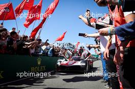 Race winners Sebastien Buemi (SUI) / Brendon Hartley (NZL) / Ryo Hirakawa (JPN) #08 Toyota Racing, Toyota GR010, Hybrid celebrate in parc ferme. 12.06.2022. FIA World Endurance Championship, Round 3, Le Mans 24 Hours Race, Le Mans, France, Sunday