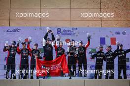 The podium (L to R): Brendon Hartley (NZL), Sebastien Buemi (SUI), Ryo Hirakawa (JPN) #08 Toyota Gazoo Racing, second; Kamui Kobayashi (JPN), Jose Maria Lopez (ARG), Mike Conway (GBR) #07 Toyota Gazoo Racing, winners;  Nicolas Lapierre (FRA); Andre Negrao (BRA), Mathieu Vaxiviere (FRA) #36 Alpine Elf Matmut, third. 12.11.2022. FIA World Endurance Championship, Round 6, Eight Hours of Bahrain, Sakhir, Bahrain, Saturday.