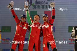 GTE Pro winners Antonio Fuoco (ITA) / Miguel Molina (ESP) #52 AF Corse Ferrari celebrate on the podium. 12.11.2022. FIA World Endurance Championship, Round 6, Eight Hours of Bahrain, Sakhir, Bahrain, Saturday.