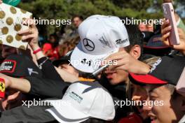 Circuit atmosphere - fans with Lewis Hamilton (GBR) Mercedes AMG F1 caps. 31.03.2023. Formula 1 World Championship, Rd 3, Australian Grand Prix, Albert Park, Melbourne, Australia, Practice Day.
