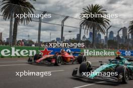 Carlos Sainz Jr (ESP) Ferrari SF-23 and Fernando Alonso (ESP) Aston Martin F1 Team AMR23. 31.03.2023. Formula 1 World Championship, Rd 3, Australian Grand Prix, Albert Park, Melbourne, Australia, Practice Day.